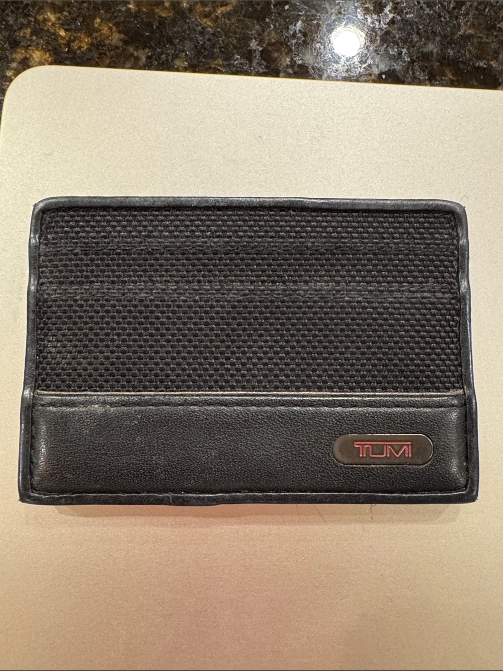 Tumi Black Textured Card Sleeve with Red Logo